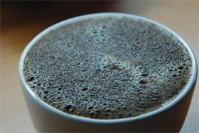 Freshly brewed Edelweiss coffee close-up showing rich crema